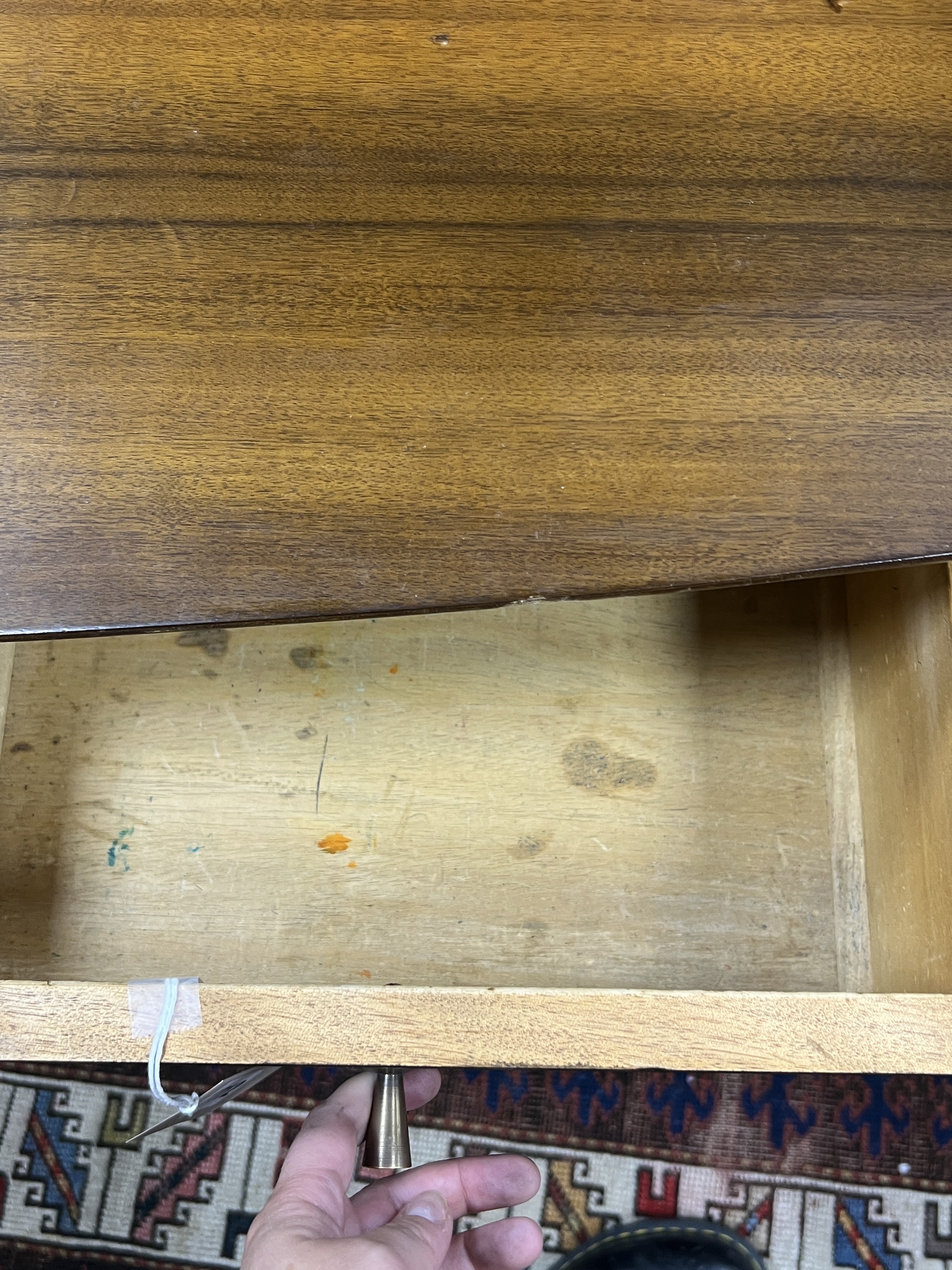 A mid century walnut desk, width 108cm, depth 64cm, height 75cm